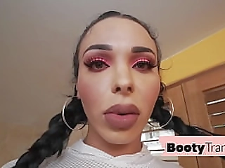 two shemales having fun with their huge dildo on cam