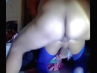 chubby asian shemale with glasses plays with her natural tits in bed