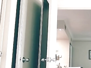 tranny stroking her big cock in her hotel balcony