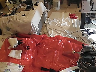 cumming in latex while fucked by a machine
