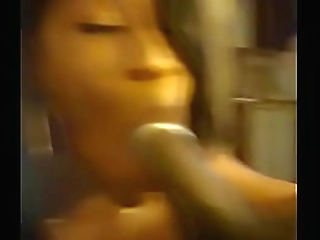 dirty tranny sucking on a big black cock