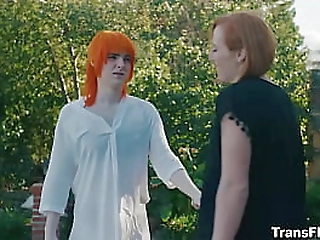 a man has a bisexual penetration with a cute shemale and a cute girl