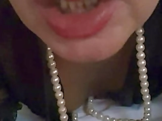 brunette beauty jerks off with glasses on