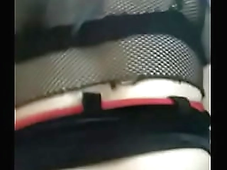 leather wearing shemale performs a striptease and jerks off